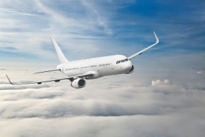 Commercial aircraft flying in the clouds